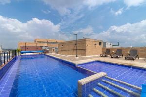 Swimmingpoolen hos eller tæt på Loft moderno con excelentes amenities