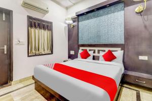 En eller flere senge i et værelse på Super Hotel O Vintage House