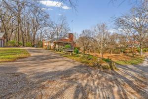 an empty road in front of a house at Nanas Nook on Hickory Grove in Clarksville