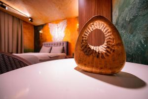 a wooden shell sitting on top of a table at Cappadocia Divin House in Goreme