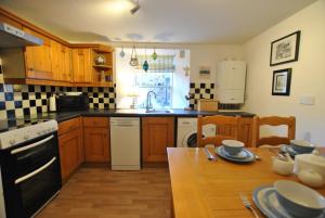 Kuchyň nebo kuchyňský kout v ubytování Sandpiper Cottage- Coastal hideaway + 17 fotografií