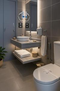 Koupelna v ubytování Elite Hotel