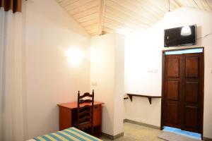 Et tv og/eller underholdning på Galle My Bungalow