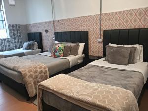 Ένα ή περισσότερα κρεβάτια σε δωμάτιο στο Casa Samor La Candelaria