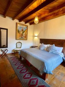 En eller flere senge i et værelse på Casa Mesones 1