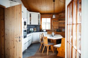 Kuchyň nebo kuchyňský kout v ubytování Family Retreat Maria Alm