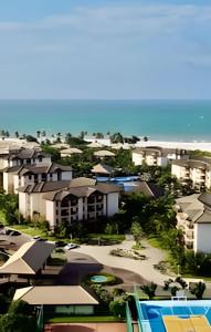 arial view of a city with houses and the beach at Bungalow Frente Mar N 101 in Caucaia