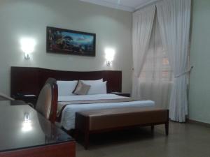 Voodi või voodid majutusasutuse Conference Hotel & Suites Ijebu toas