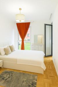 Giường trong phòng chung tại Peja Central Hideaway