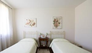 Postel nebo postele na pokoji v ubytování Le Tre Querce B&B