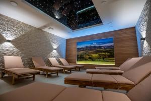 Posezení v ubytování Apartmány Lúčny Raj + 91 fotografií