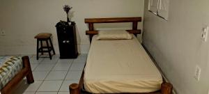 En eller flere senge i et værelse på Chalé Condomínio Porto dos Lençóis + 20 billeder