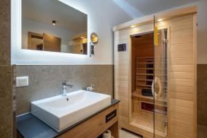 Et badeværelse på Mannharthof Apartments + 30 billeder