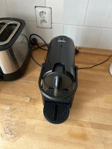 a computer sitting on the floor next to a printer at Roubenka Bratrouchov in Jablonec nad Jizerou