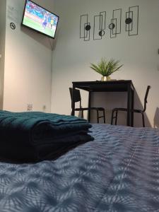 En eller flere senge i et værelse på Studio cœur de ville + 4 billeder