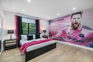 a bedroom with a bed and a large poster on the wall at Luxury Home with Inter Miami Theme in Miami