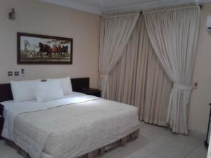 Voodi või voodid majutusasutuse Conference Hotel & Suites Ijebu toas