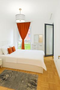 Giường trong phòng chung tại Peja Central Hideaway