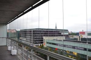a view of a building from a balcony at Viru Väljak Homes in Tallinn