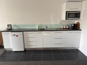 Køkken eller tekøkken på Bay View - Lounge Lovers