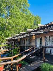 Zahrada ubytování Cabaña frente a las dunas, a 5 minutos de Mundo Marino y Termas Marinas