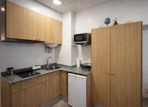 Kuchyň nebo kuchyňský kout v ubytování Alojamiento cerca de la Playa