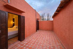 Ένα ή περισσότερα κρεβάτια σε δωμάτιο στο Gite Souss +122 φωτογραφίες