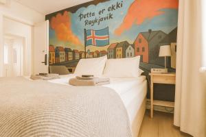 Postel nebo postele na pokoji v ubytování The Stykkishólmur Inn by Ourhotels + 27 fotografií