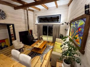 Khu vực ghế ngồi tại Casa en el Bosque Futrono