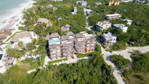 an aerial view of a resort on the beach at Casa Astral Hotel Boutique and Apartments in Holbox Island