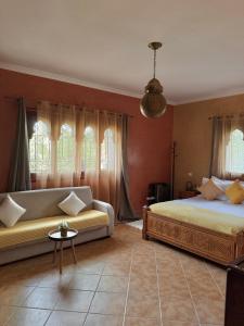 En eller flere senge i et værelse på Agadir-Taghazout Magnifique Villa Dar Lina 4 etoiles + 280 billeder