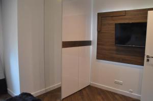 Televízia a/alebo spoločenská miestnosť v ubytovaní Apartament Silver - Stara Polana Spa