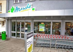 Supermarket nebo jiné obchody v  apartmánu nebo okolí