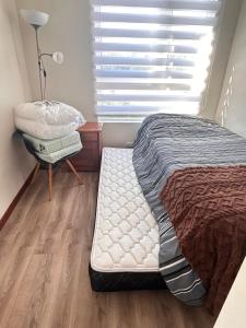 En eller flere senge i et værelse på Papudo laguna