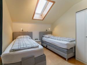 Ένα ή περισσότερα κρεβάτια σε δωμάτιο στο Fintinn