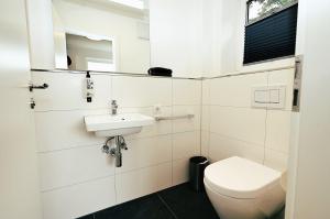 Phòng tắm tại Die-Strandburg-Moewenweg +18 ảnh