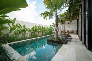 Swimmingpoolen hos eller tæt på Snuggy Shack Villas + 11 billeder