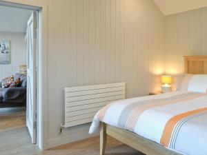 Giường trong phòng chung tại Blackberry Lodge