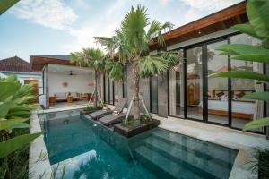 Swimmingpoolen hos eller tæt på Snuggy Shack Villas