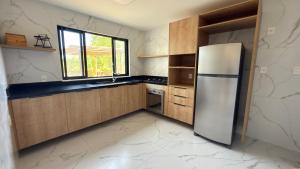 Køkken eller tekøkken på Casa 49 Reserva Sauípe