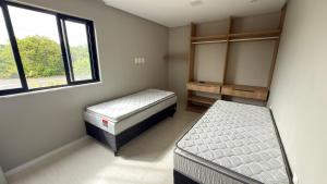 En eller flere senge i et værelse på Casa 49 Reserva Sauípe + 17 billeder