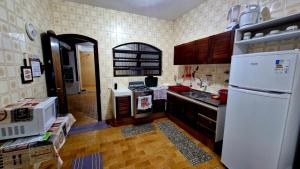 Køkken eller tekøkken på Casa de Praia Itanhaem