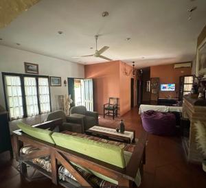 a living room with a couch and a table at La Gloria in Paso de la Patria