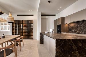 Køkken eller tekøkken på Private Villa Houlakia Mikonos