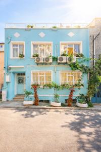 a blue building with plants in front of it at Konak Grand Bella Sultanahmet in Istanbul