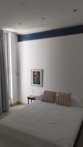 En eller flere senge i et værelse på BMAhouse D SINSACATE CBA