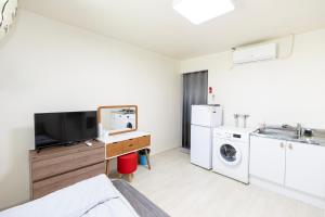 Η κουζίνα ή μικρή κουζίνα στο Wandonesia