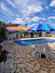 Swimmingpoolen hos eller tæt på Pousada Recanto da Preguiça