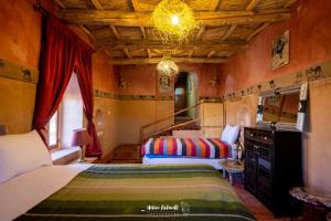 Giường trong phòng chung tại Kasbah ben Ali +169 ảnh