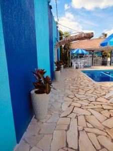 Swimmingpoolen hos eller tæt på Pousada Recanto da Preguiça